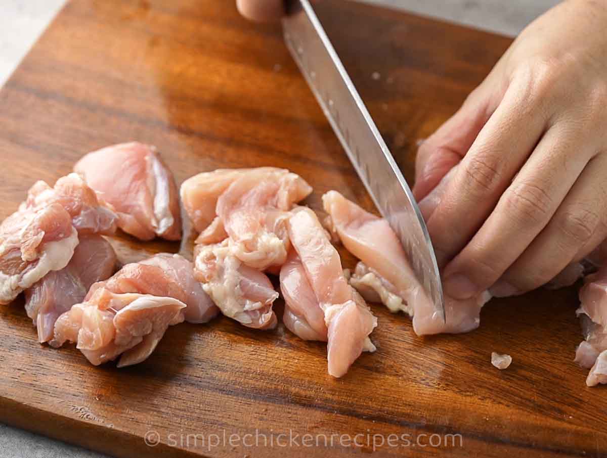 slicing chicken thighs for stir fry