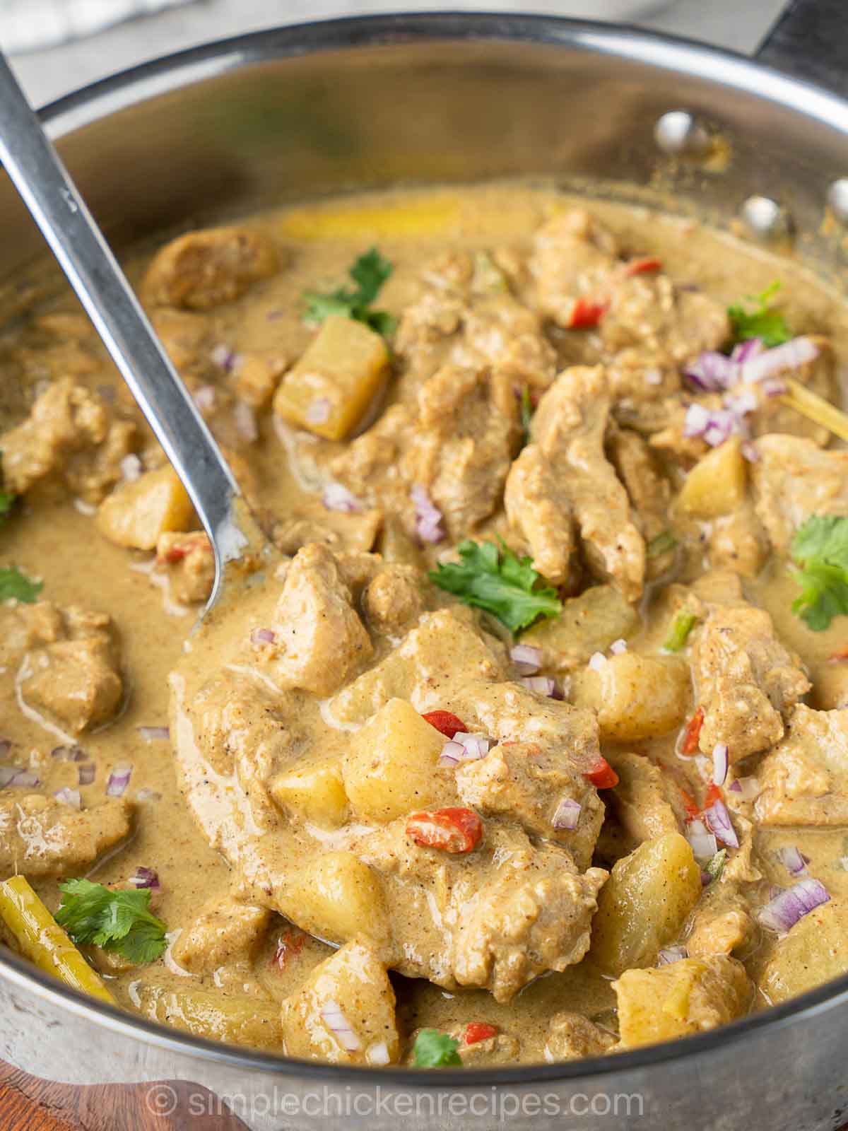 boneless chicken curry made with coconut milk and potatoes.